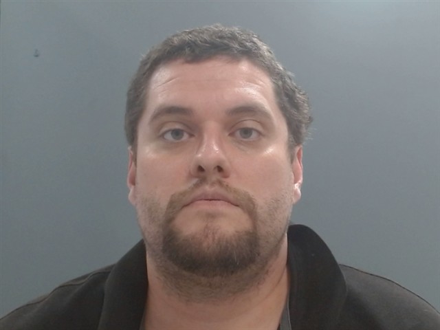 Booking photo of Matthew Miller