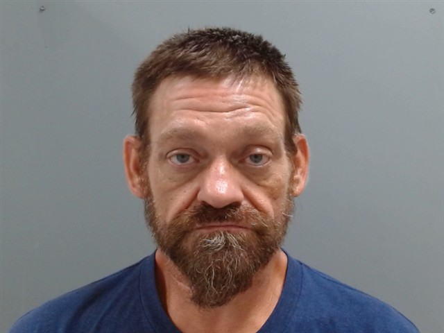Booking photo of John Adams