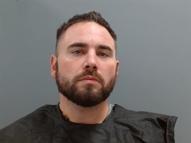 Booking photo of Travis Buchele