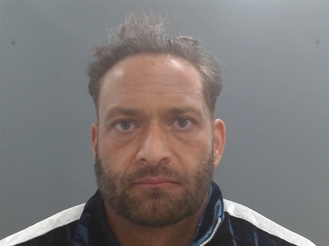 Booking photo of Nicholas Davis