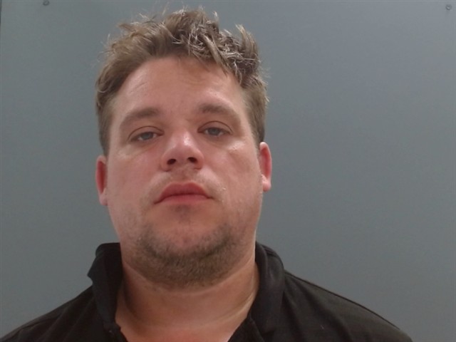 Booking photo of Christopher Craig