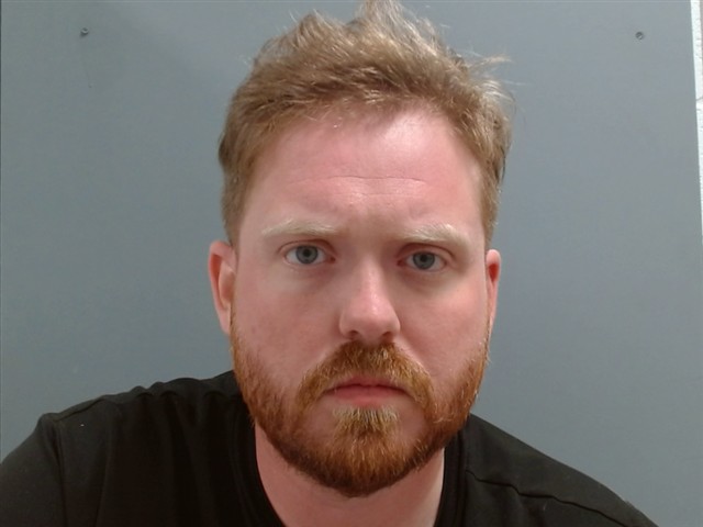 Booking photo of John Cowan