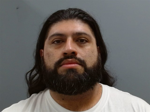 Booking photo of Adan Melchor-garcia