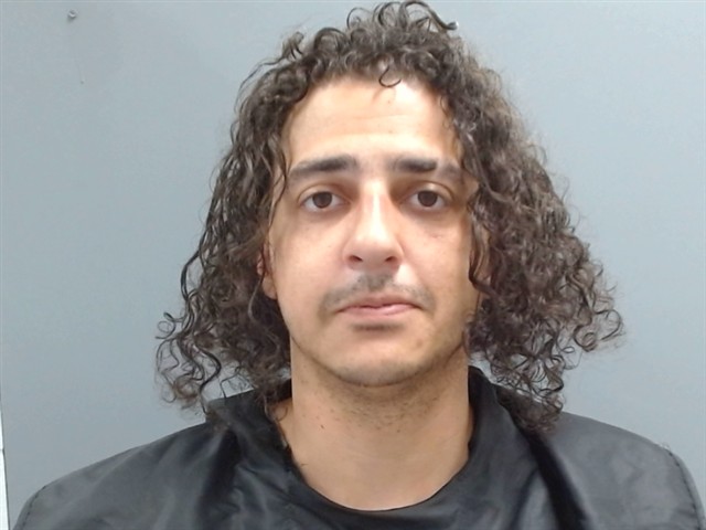 Booking photo of Raymond Henson