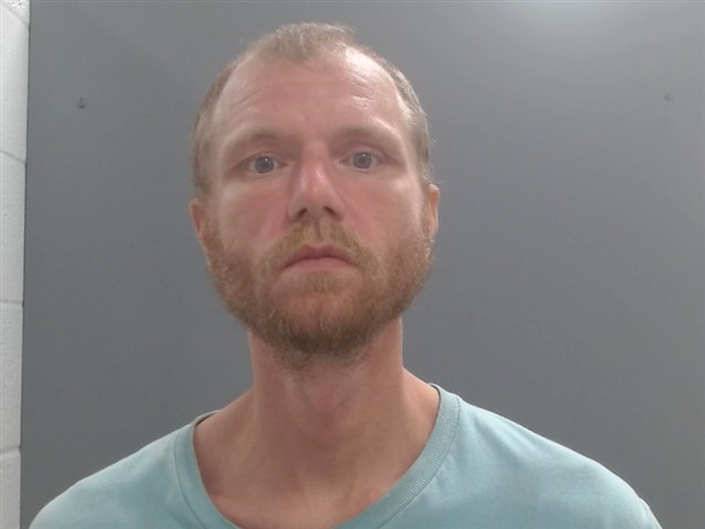 Booking photo of Dustin Jones