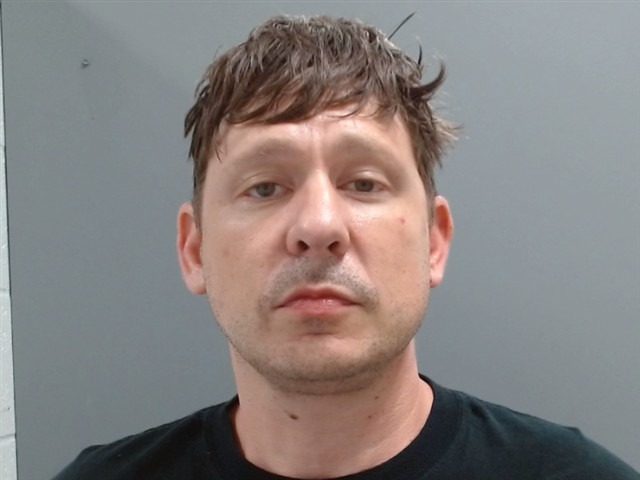 Booking photo of Devin Tomlinson