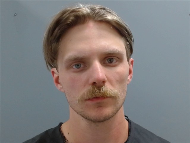 Booking photo of Justin Watson