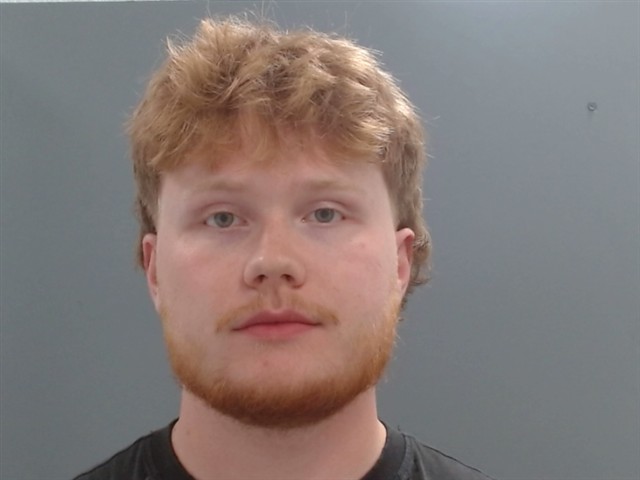 Booking photo of Logan Mustin