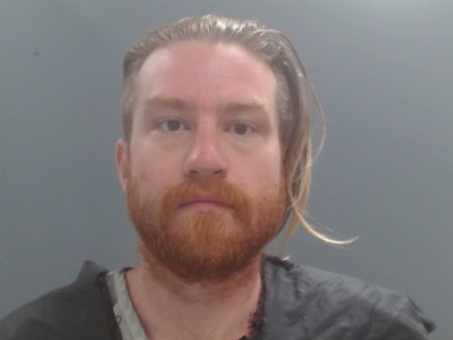 Booking photo of Elijah Riddle