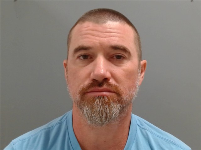 Booking photo of Anthony Hughes