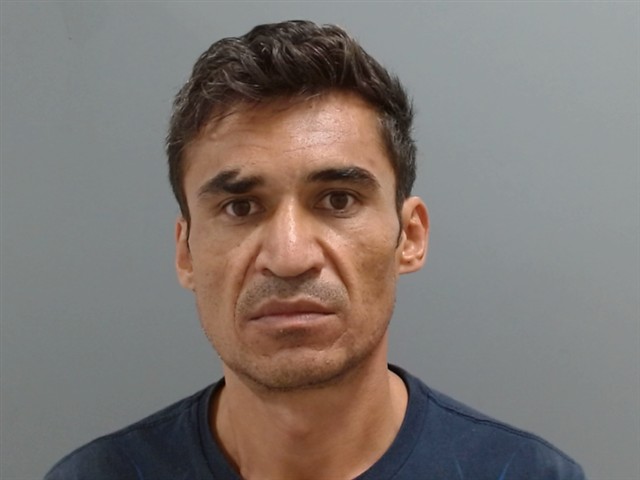 Booking photo of Karim Akhlaqi