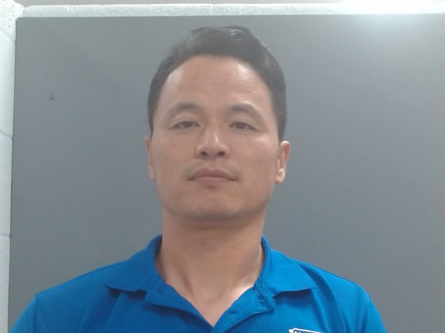 Booking photo of Xu Shaobing