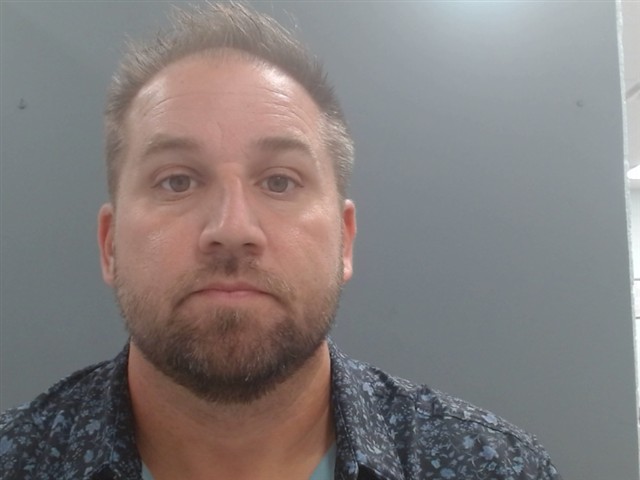 Christopher Cox booking photo