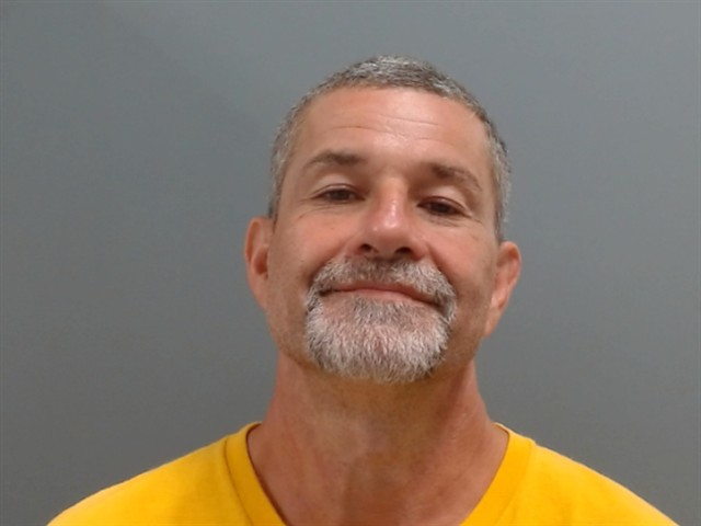 Booking photo of Derek Tate