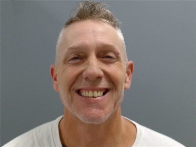 Booking photo of Justin Cameron