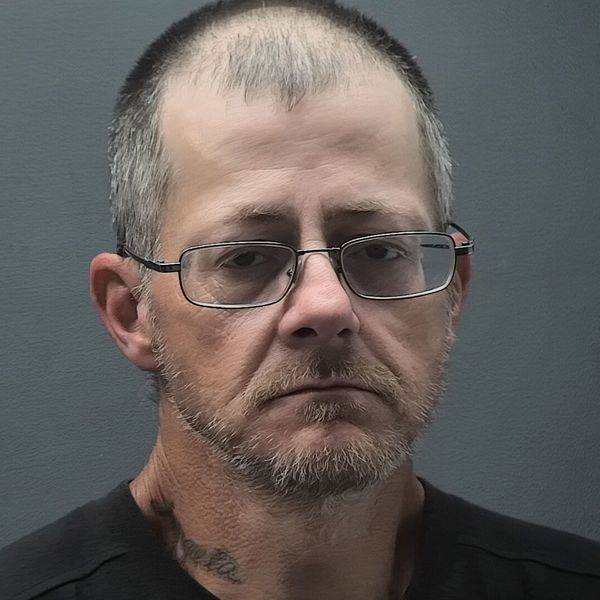 Booking photo of Michael Cook