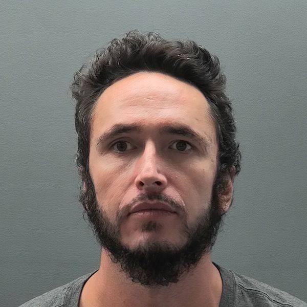 Booking photo of Mitchell Howell