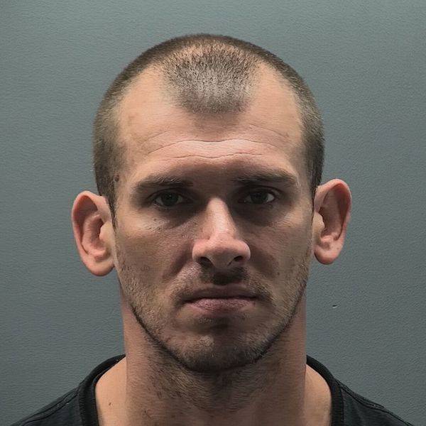 Booking photo of Derek Nickels