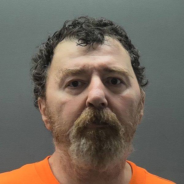 Booking photo of Johnny Bugg