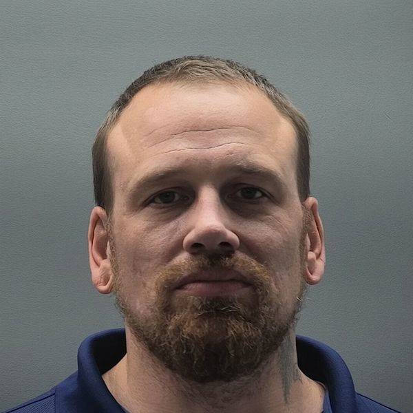 Booking photo of Andrew Hamilton