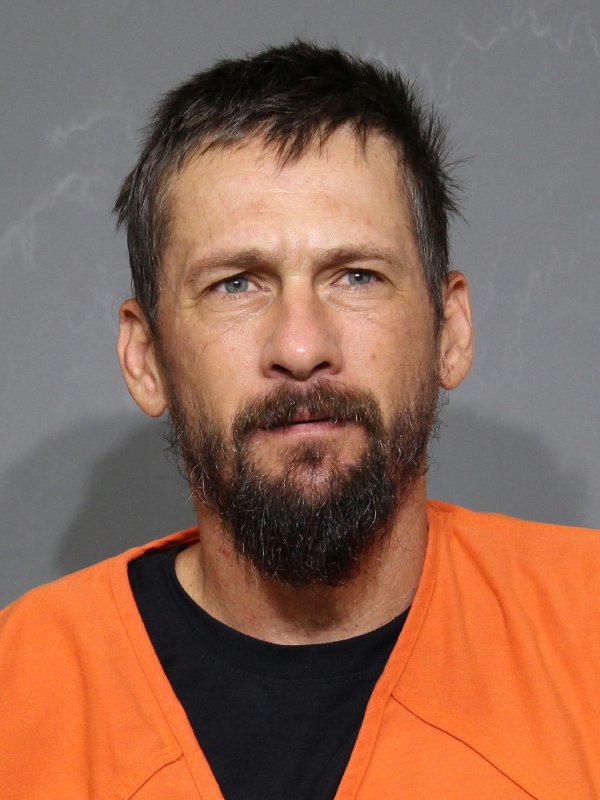 Booking photo of Adam Jay Barber
