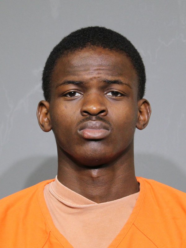 Booking photo of Olatoyosi Faruq Aderoju